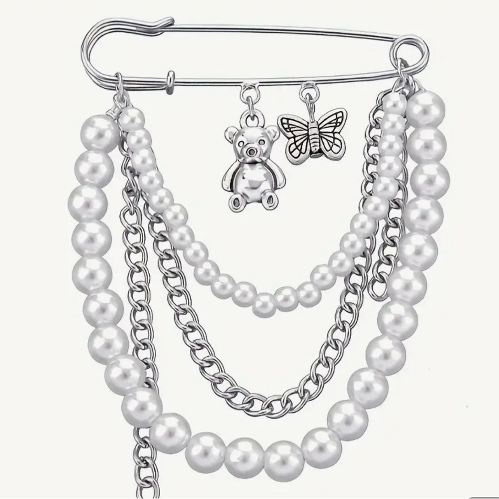 Silver and White Pearl Brooch with Charms